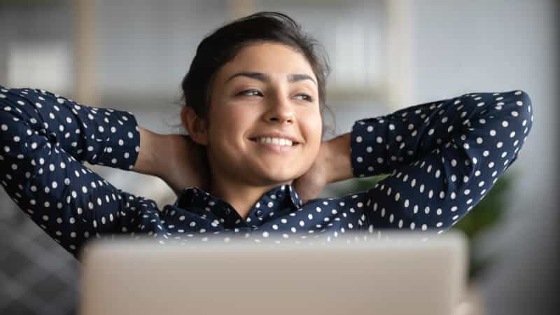 Woman Relaxing Laptop Shutterstock 1606120414