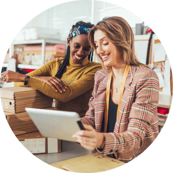 Sales Online Working Women At Their Store They Accepting New Orders Online And Packing Merchandise For Customer 1193259261 Sales Online. Working women at their store. They accepting new orders online and packing merchandise for customer.